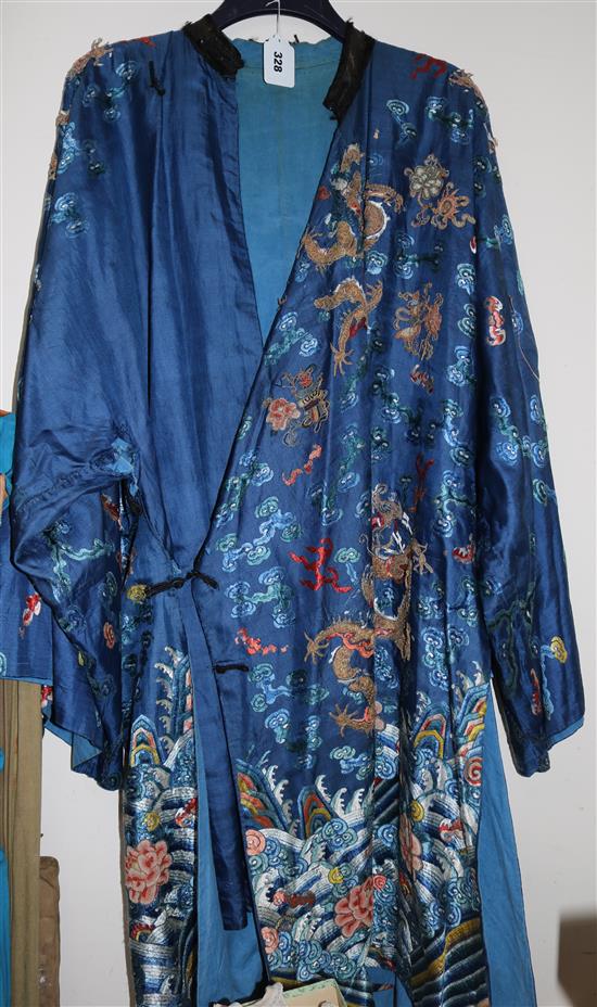 A Chinese embroidered silk and metal thread dragon robe, late 19th / early 20th century, faults